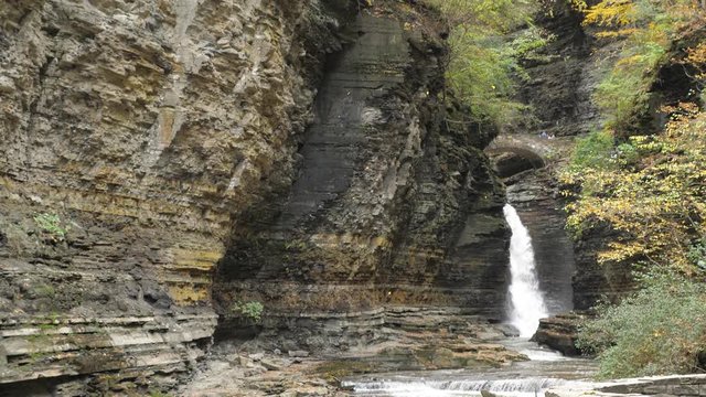 Watkins Glen State Park leaves falling into deep natural gorge with waterfall 01