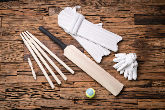Cricket Accessories And Tools On Textured Backdrop