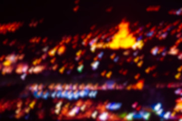 blurred background of multicolored lights of the night city