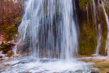Fototapeta na wymiar closeup waterfall on a mountain river
