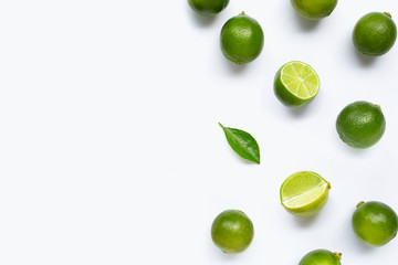 Fresh limes with leaf isolated on white