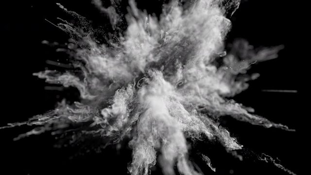 Cg animation of white powder explosion on black background. Macro. Slow motion movement with acceleration in the beginning. Has alpha matte.