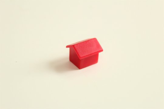 Red House Toy On White Background.