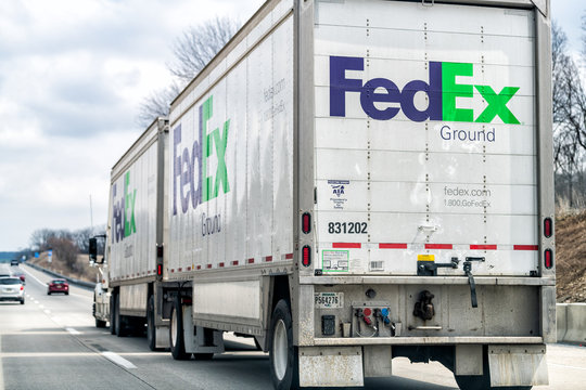 Hamburg, USA - April 6, 2018: Highway 78 in Pennsylvania road with large FedEx truck and cars in traffic