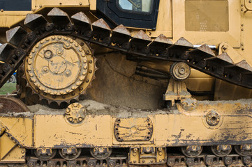 Fototapeta na wymiar Detail of bulldozer, a heavy construction machine.