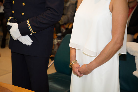 wedding military groom bride white dress ceremony