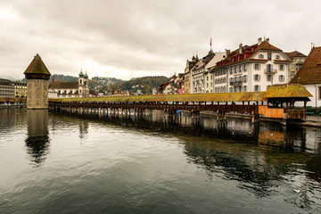 Fototapeta na wymiar Lucerne historic city center view of famous Chapel Bridge and lake Vierwaldstattersee, Canton of Lucerne, Switzerland
