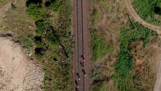 Rail track maintenance workers inspect and repair railway tracks. Sukhyi Lyman, Odessa, Ukraine, 2019.