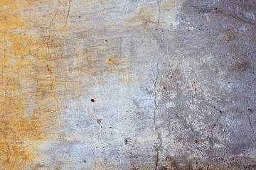 Yellow grey plaster old and cracked