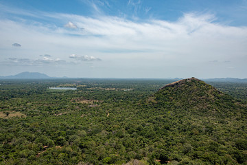 vista of  mountains, lakes and jungle  from the top if the Lion Rock