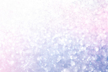 Christmas New Year colorful defocused pastel background with snowflakes and blinking stars.