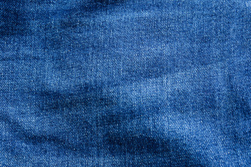 Denim , Blue Jeans Fabric pattern abstract  Canvas vintage fashion design space  for background , Jean texture closeup soft focus.
