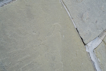 Old beautiful wall and big stone. Background. Texture.