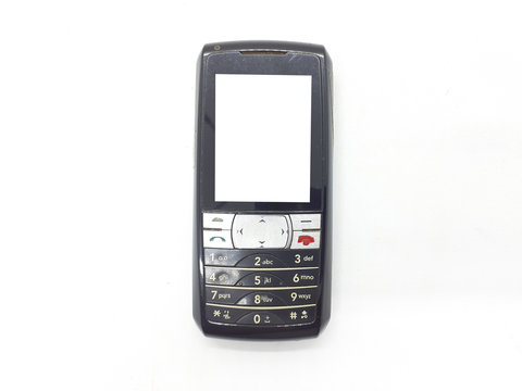 Handheld Black Silver Metallic Color Vintage Retro Old Broken Used Mobile Phone with Keypad for Messaging and Call only in White Isolated Background