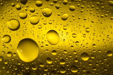 Biodiesel, bubbles biofuel, vegetable oil, yellow and orange emulsion bubbles background