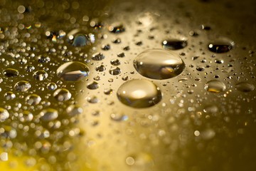 Biodiesel, bubbles biofuel, vegetable oil, yellow and orange emulsion bubbles background