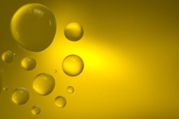 Yellow cooking Oil bubble and drops on water for background.