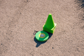 Collected cones on the site for bikers.  Traffic cones on the training ground in the driving...