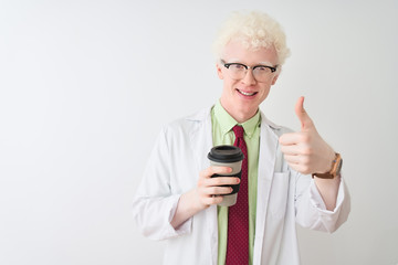 Albino scientist man wearing glasses drinking take away coffee over isolated white background happy with big smile doing ok sign, thumb up with fingers, excellent sign