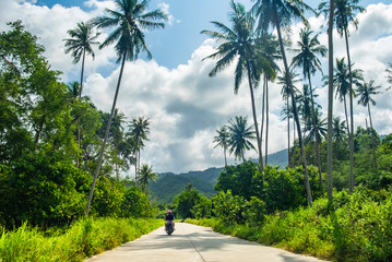 Riding scooter through jungles in Thailand, Koh Samui