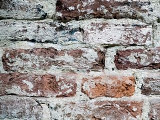 Texture of old brickwork in a historic building of the 19th century
