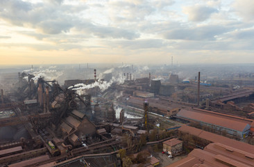 Aerial view. Pipes Throwing Smoke in the Sky.