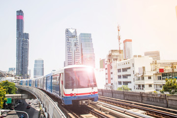 Fototapeta premium Traveling by morning train in Bangkok, Thailand