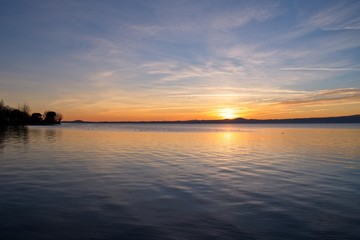 Fototapeta na wymiar landscape and view of Lake Bolsena at sunset, Viterbo province, Lazio, Italy