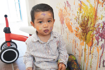 Asian boys one year and three months playing color mixing activities artist concept.