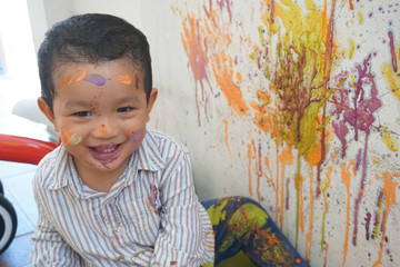 Asian boys one year and three months playing color mixing activities artist concept.