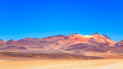 Fototapeta na wymiar View of the beautiful mountain and (Salvador Dali) Siloli Desert in Uyuni Bolivia