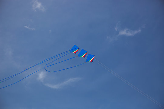 Three flying kytes in flight
