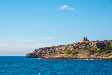 Watchtower near ionian sea (Uluzzo tower in Porto Selvaggio) Apulia, Salento, Italy