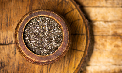 Chia seeds in a bowl top view