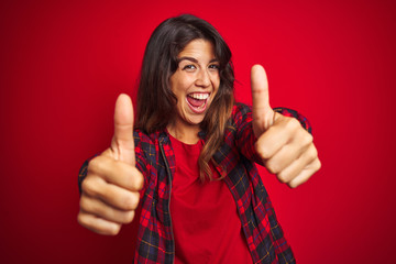 Young beautiful woman wearing casual jacket standing over red isolated background Doing time out...
