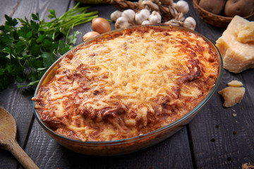 Homemade cheese pie with potatoes and meat