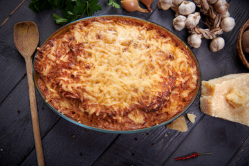 Homemade cheese pie with potatoes and meat