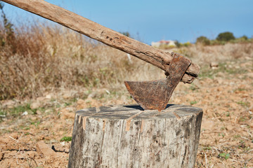 A axe stuck in a piece cutter