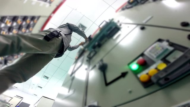 Engineer to check electrical control cabinet in substation building