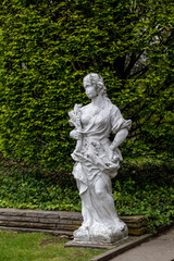 Fototapeta premium Statue of a woman in the Rockefeller Greenhouse Park in Cleveland, Ohio