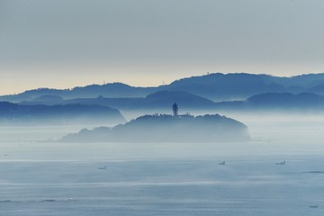 A distant view of the Japanese tourist attraction “Enoshima”.