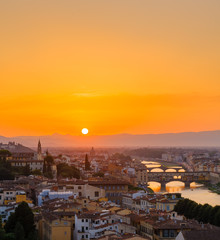 Fototapeta na wymiar Sunset over the old town of Florence, Italy.