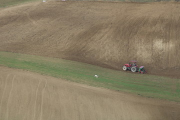 Fototapeta premium tractor in the field