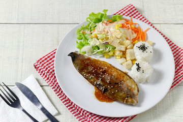 saba fish grilled soy sauce with vegetable salad and japanese rice with black sesame seed sprinkles