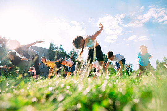 Yoga Classes Outside On The Open Air. Kids Yoga,