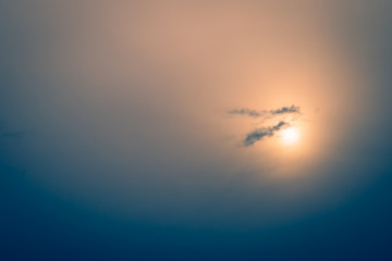 Sunset at the beach shows the texture and erosion of the beach.