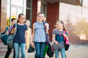 Group of kids going to school together.