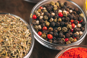 The Different Spices. Spices on stone background.