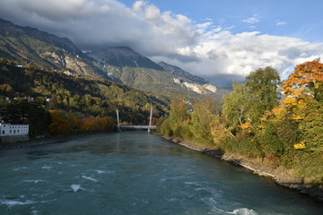 Innsbruck with river Inn and bridge in autumn