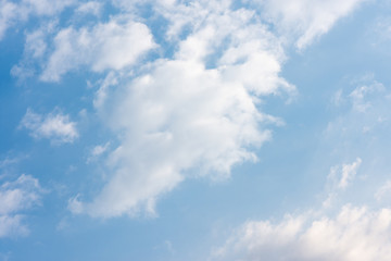 landscape sky with blue clouds and sunbeams at sunset. Background texture